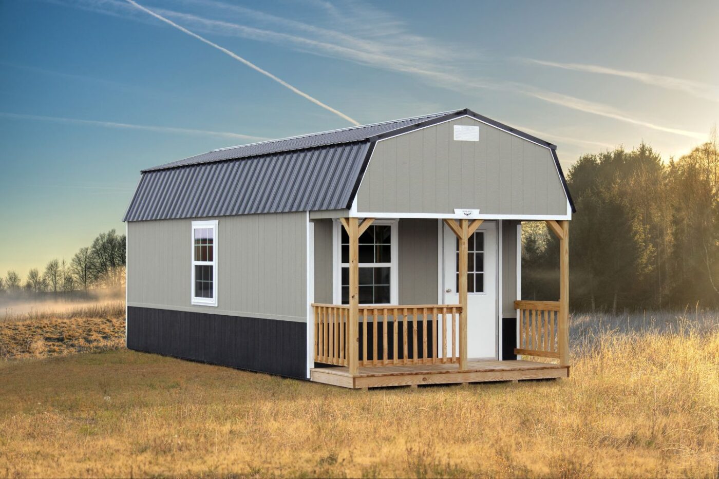 a grey portable cabin shed that is dark grey from the waist down, has white trim, a grey metal roof, a white door, and a porch for sale in bald knob AR