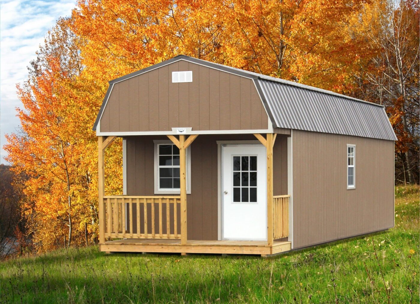 a beige portable cabin shed with white trim, a grey metal roof, a white door, and a porch for sale in judsonia AR